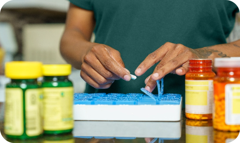 Caregiver preparing medication